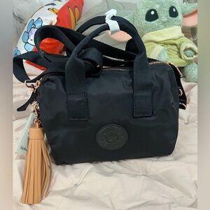 Kipling Black and Tan Crossbody Bag with Structured Design